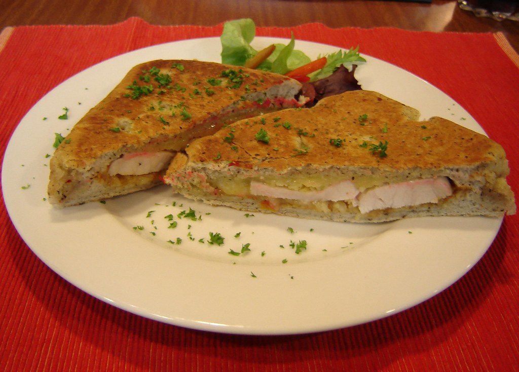 A chicken pannini covered in herbs